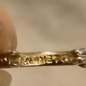 Monet gold tone small hoop earrings.